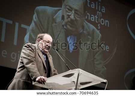 MILAN, ITALY - FEBRUARY 05: demonstration held in Milan Palasharp February 05, 2011. Umberto Eco speaks about italian political problem related to berlusconi government to thousands of people