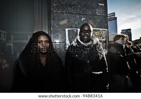 MILAN, ITALY - DECEMBER 17: manifestation against racism in Milan December, 17 2011: A big migrant group of people protest against racism and violence after the killing of their two compatriots