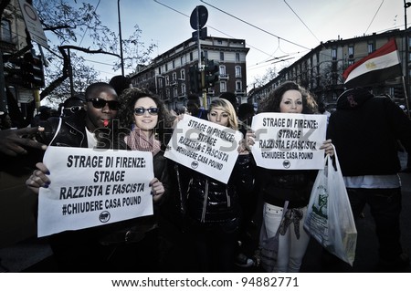 MILAN, ITALY - DECEMBER 17: manifestation against racism in Milan December, 17 2011: A big migrant group of people protest against racism and violence after the killing of their two compatriots