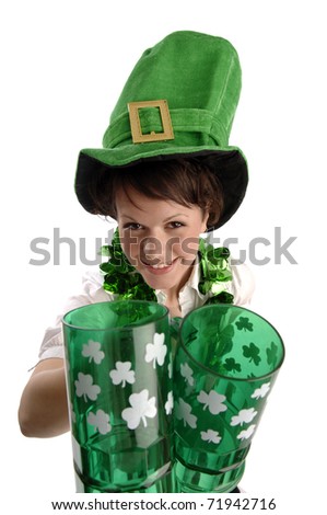 Young pretty woman wearing green hat celebrates St Patrick\'s day.