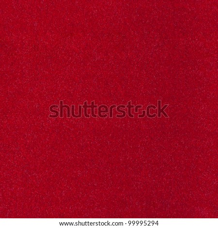 Abstract background with red texture, velvet fabric, full frame, close-up