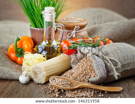 The composition of the pasta and vegetables on a white background