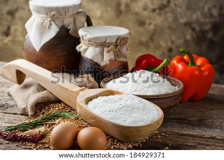 ingredients and tools to make a cake, flour,