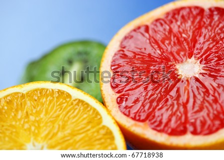 Red grapefruits isolated on white