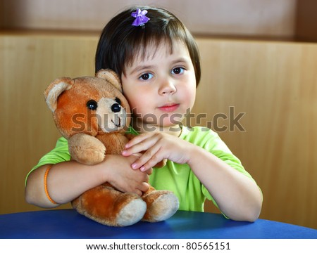 Girl Hugging Bear