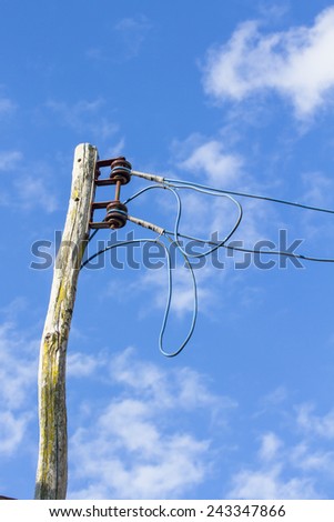 Local Electrical Wooden Pole with blue sky