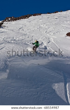 Snowboarding in Caucasus Mountains
