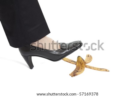 stock photo : Woman's foot about to slip on banana peel