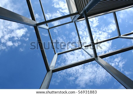 iron structure of building and blue sky