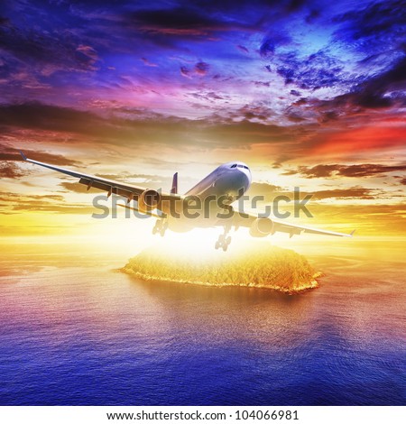 Jet plane over tropical island at sunset time. Square composition.