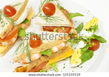 Shrimp sandwiches on the plate