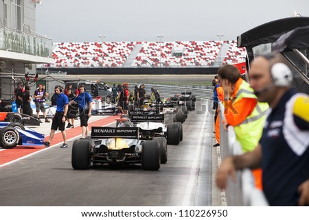 MOSCOW - JULY 13: View of Renault Formula 2.0 cars racing at the Moscow Raceway circuit on July 13, 2012 in Moscow, Russia.The first events held at the circuit were part of the World Series by Renault