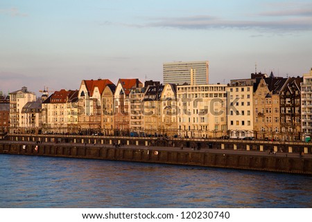 View of building facades of Dusseldorf embankment at the sunset, Germany