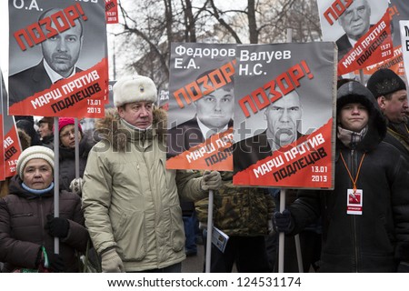 MOSCOW-JAN13:View of people on March Against Adoption Ban in Moscow on Jan 13,2013.People held march in Moscow to protest a recently adopted law that bans adoption of Russian children by US citizens