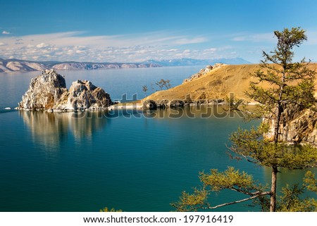 View of coast of Baikal lake, Shaman rock and cape Burhan on Olkhon Island, Russia