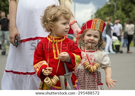 MOSCOW,RUSSIA - JULY 11: Participants of a Baby Stroller Parade in Gorky Park during the celebration of the Day of Family, Love and Fidelity on 11 of July 2015 in Moscow, Russia