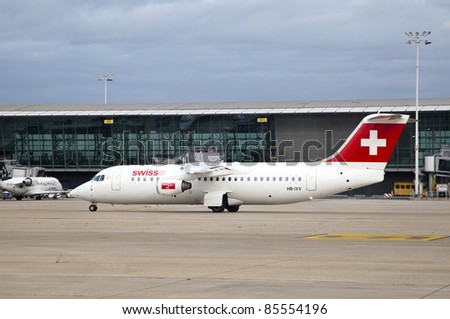 BRUSSELS, BELGIUM - SEPT 17: A Swiss Air airplane lands at the airport in Brussels, Belgium on Sept. 17,  2011 in Brussels, Belgium. Swiss Airlines has been named “Europe’s Leading Airline Business Class” of World Travel Awards