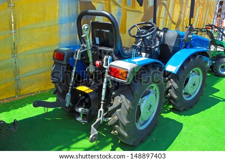 Exhibition vehicles at agricultural fair, Tractor,