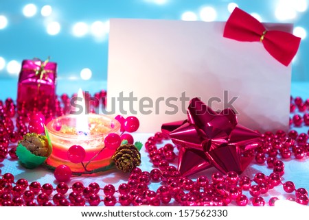 Beautiful ornaments, candles and greeting card as a New Year decoration, New Year decorations, photography