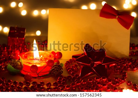 Beautiful ornaments, candles and greeting card as a New Year decoration, New Year decorations, photography