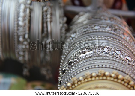 colorful traditional jewelry from India in a marketplace.