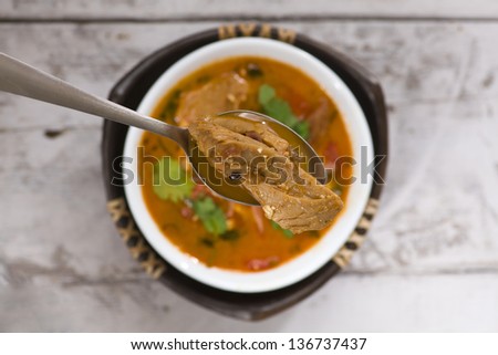 tomato soup with soy meat, carrot, onion and potato