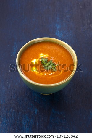 traditional indian tomato soup on kitchen table