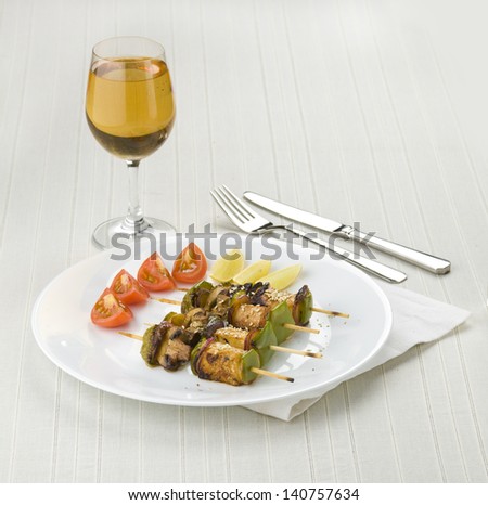veggie skewers with mushrooms, bell pepper, cottage cheese, lime and tomatoes