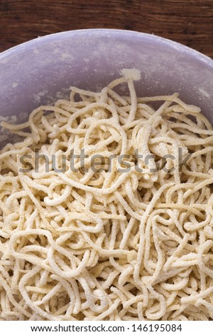 Homemade chinese noodles in plate ready to cook