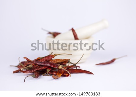 Indian spices, red chili with mortar and pestle