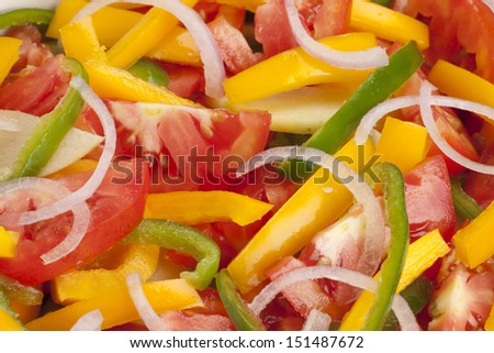Salad texture background with onion, yellow and green bell pepper