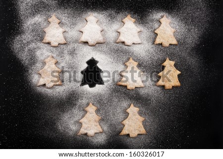 christmas gingerbread tree and stars cookies. Spaces on tray left after cookies were taken