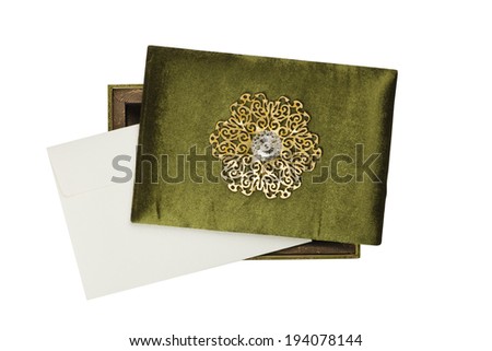 green Indian wedding invitation velvet box isolated on white background