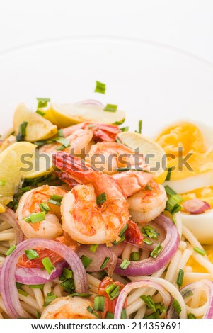 Prawn Noodles with eggs, lime, and onion
