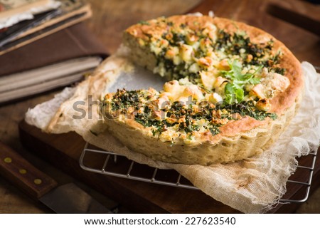 The recipe of potato and cheese pie with herbs and sour creme