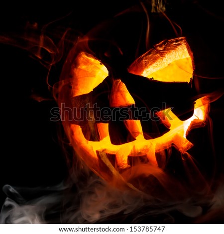 Halloween old jack-o-lantern on black background Halloween old jack-o-lantern on black background