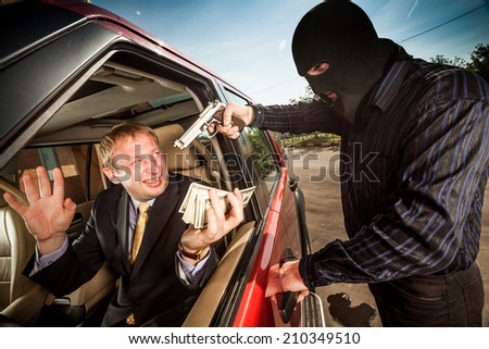 Robbery of the businessman in its car