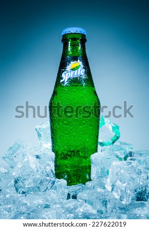 MOSCOW, RUSSIA-APRIL 4, 2014: Bottle of Coca Cola company soft drink Sprite on ice. It was introduced in the United States in 1961. This was Coke\'s response to the popularity of 7 Up.