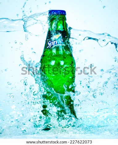 MOSCOW, RUSSIA-APRIL 4, 2014: Bottle of Coca Cola company soft drink Sprite in water. It was introduced in the United States in 1961. This was Coke\'s response to the popularity of 7 Up.