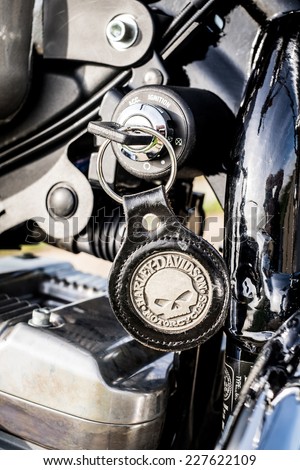 RUSSIA-JULY 7, 2013: Harley-Davidson ignition key skull Sportster 883. Harley-Davidson sustains a large brand community which keeps active through clubs, events, and a museum.