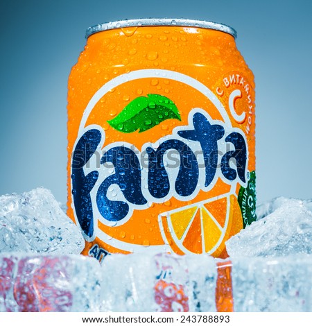 MOSCOW, RUSSIA-APRIL 4, 2014: Can of Coca Cola company soft drink Fanta Orange on ice. Fanta is a global brand of fruit-flavored carbonated soft drinks created by The Coca-Cola Company.