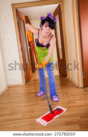 housewife washes a floor in the house