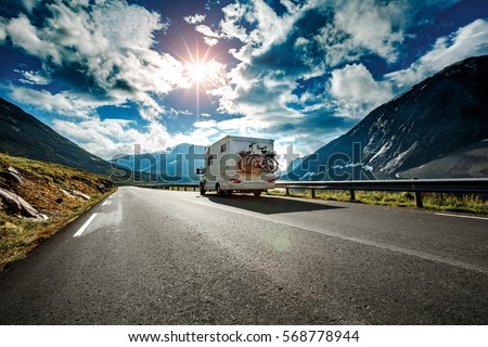 Caravan car travels on the highway.