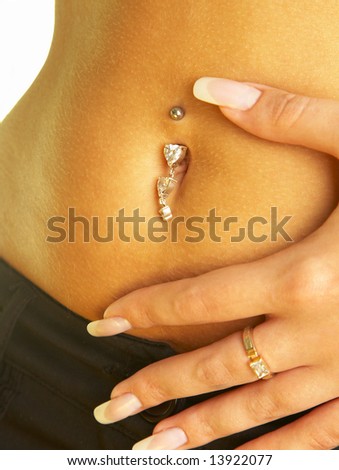 stock photo : female navel with piercing.