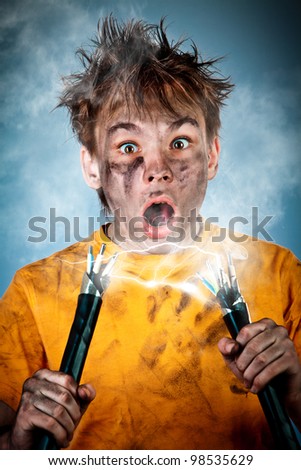 stock-photo-electric-shock-sees-a-shocked-boy-98535629.jpg