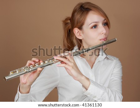 beautiful blond woman holding a flute