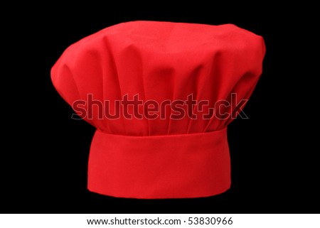 red fabric chief cook hat isolated on black background