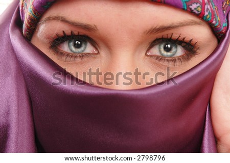 beautiful woman wearing a purple face cover