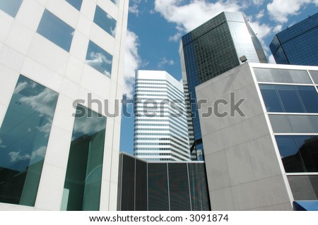 a photo of multiple sky scrapers in downtown denver