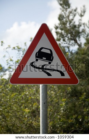 Slippery surface road sign
